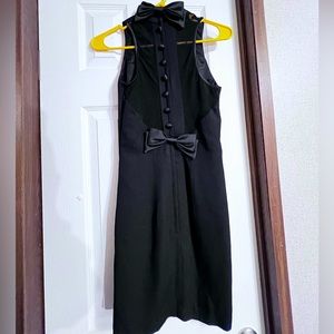 Super cute black dress, plain front with fun mesh back